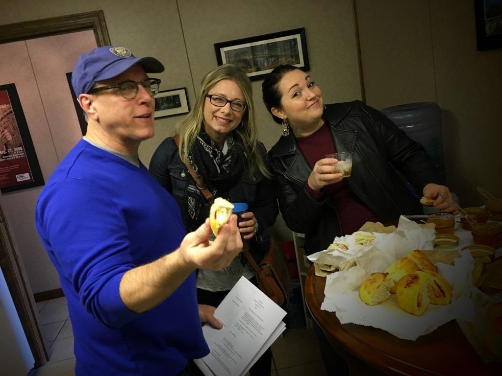 John Chamberlin is in the PPN kitchen with guests Heidi Balas (center) of The Steel Trap blog and Elizabeth Colluzza (right) of the BeezusKiddo blog, enjoying breads and jams from Batch Homegrown and Home Made in Saxonburg, Pa.