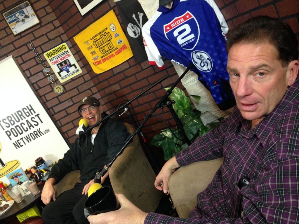 The ever-aggravated comedian John Knight (right) waiting for co-host John Chamberlin to wrap-up donut talk...