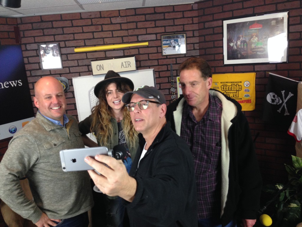 YaJagoff! co-hosts John Chamberlin (center) and Craig Tumas (left) take the post-show selfie with comedian John Knight (right) and guest listener Jessa Gibboney (rear)