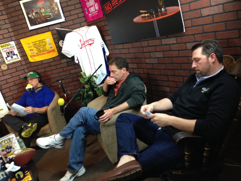 Co-host John Chamberlin (left) gets ready to bring on guests comedian John Knight (center) and Tim Murdoch (right) from the Wilkinsburg CDC.