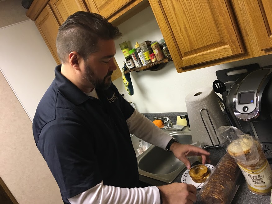 Scott Baker butters up some toasted Jenny Lee Cinnamon Swirl Bread from his own 5 Generations Bakery!